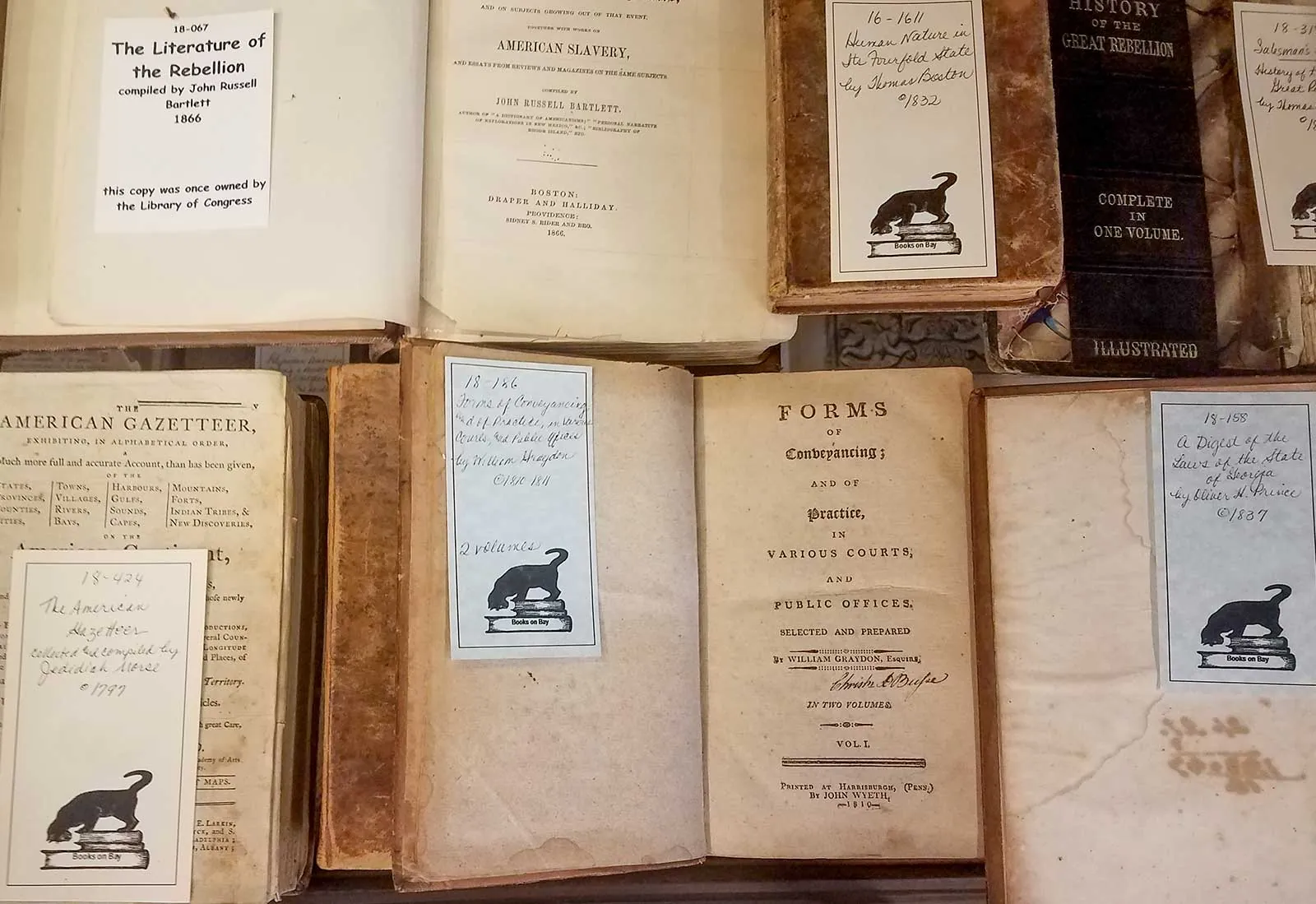 Antique books at Books on Bay, Savannah Antique leather-bound books with Books on Bay bookmarks in Savannah, GA