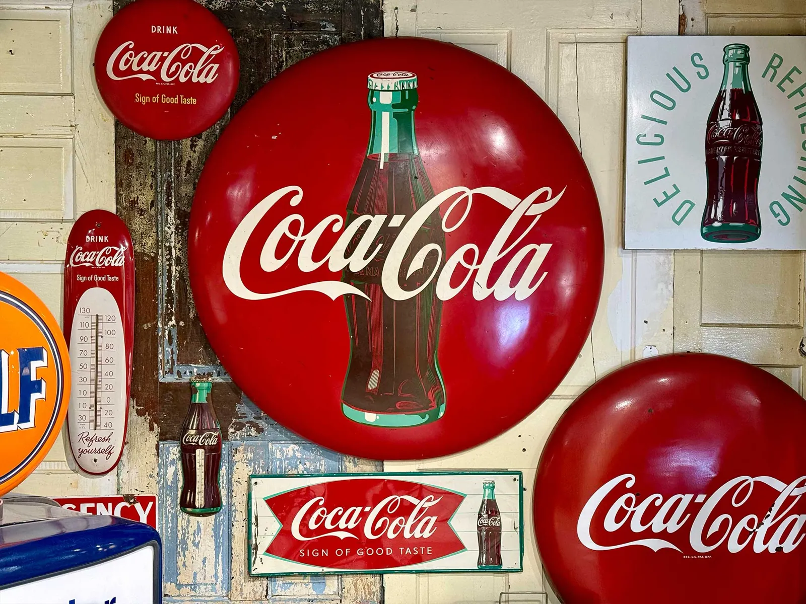 Savannah antiques - Picker Joe’s Antique Mall (4) Wall of vintage Coca-Cola signs at Picker Joe's Antique Mall, an antique mall in Savannah, GA
