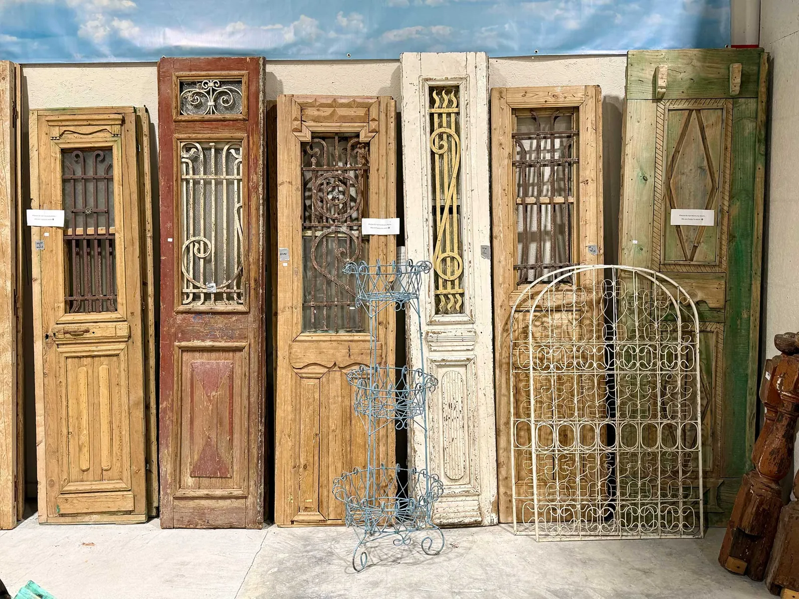 Savannah antiques - Picker Joe’s Antique Mall (7) Architectural salvage doors and an iron gate at Picker Joe's Antique Mall in Savannah, GA